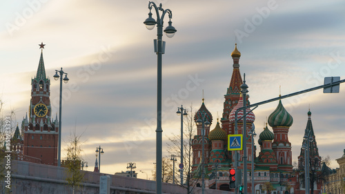 Photography of the domes of the Saint Basil's Cathedral / Cathedral of Vasily the Blessed and Spasskaya Tower. Moscow Red Square. Coronavirus pandemic time. No people.