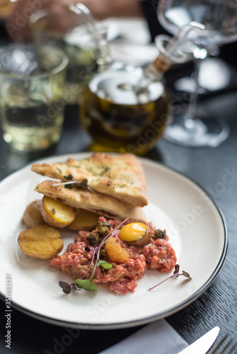 Beef Tartare with Egg Yolk, Fish Roe and Fried Potatoes