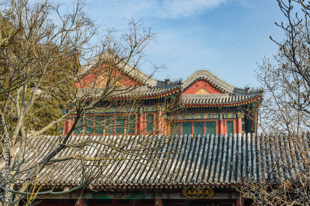 Classical Chinese style buildings, house between trees.