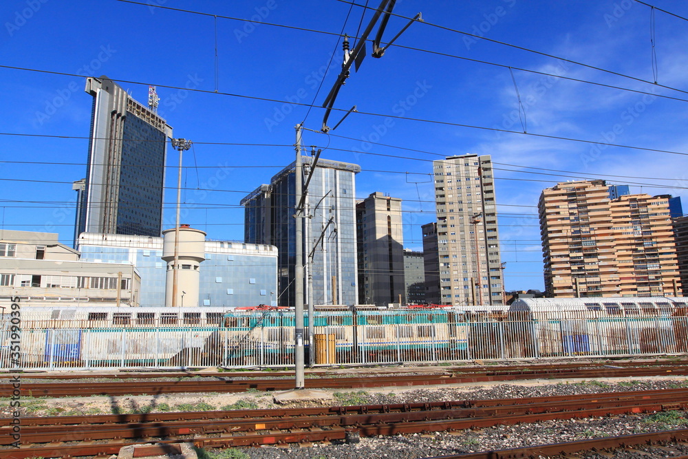 Obraz premium Naples central business District ( Napoli centro direzionale) photographed from the Napoli Centrale Train station. Campania, Italy.