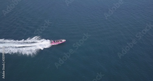Wallpaper Mural Aerial view of luxury motor boat racing on the water. Torontodigital.ca