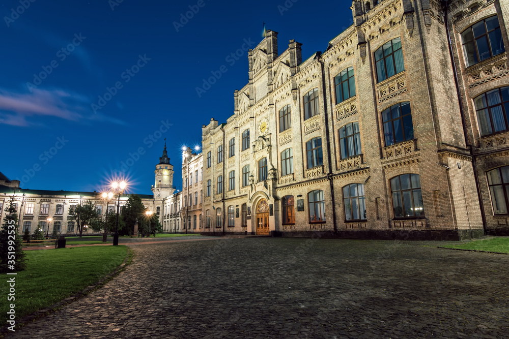 
The main campus of the university, famous places of Kiev, the old building in the evening, the building of the Kiev Polytechnic Institute, a summer evening in the park