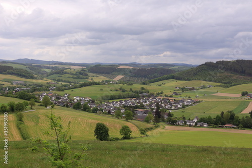 Blick auf einen kleinen Ort im Sauerland bei Eslohe photo