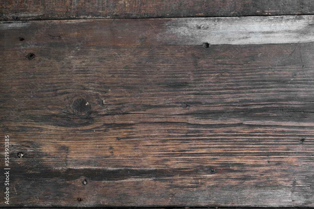 Old wooden boards. Weathered surface and cracks. Top view. Old wooden boards. Weathered surface and cracks. Top view.