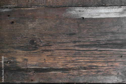 Old wooden boards. Weathered surface and cracks. Top view.