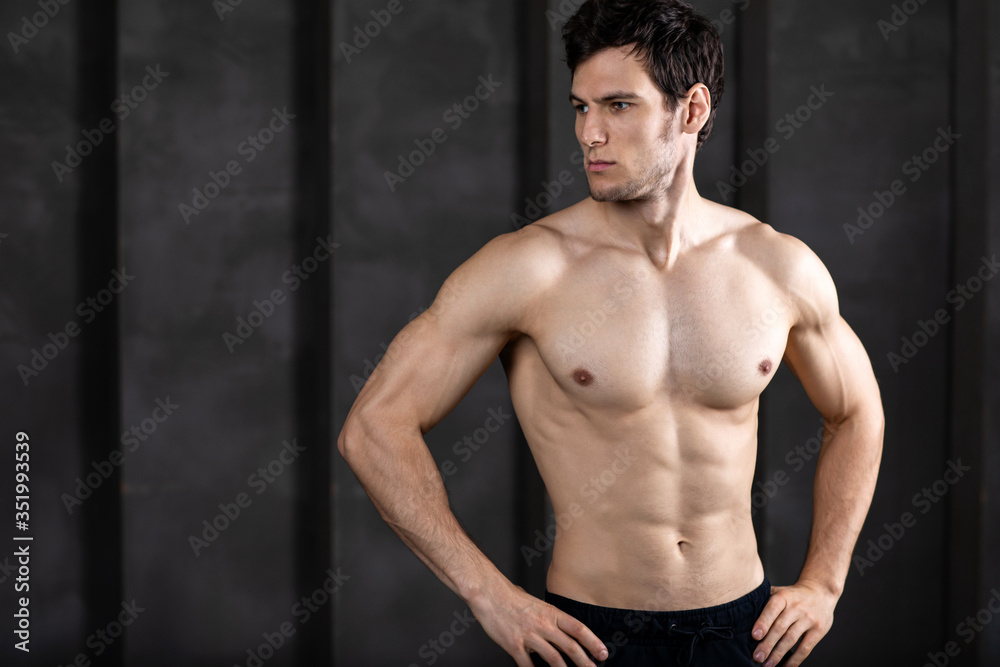 Fototapeta premium Strong athletic man fitness model.