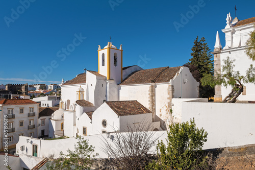 View of the church of Santiago in the center of Tavira, Algarve, Portugal