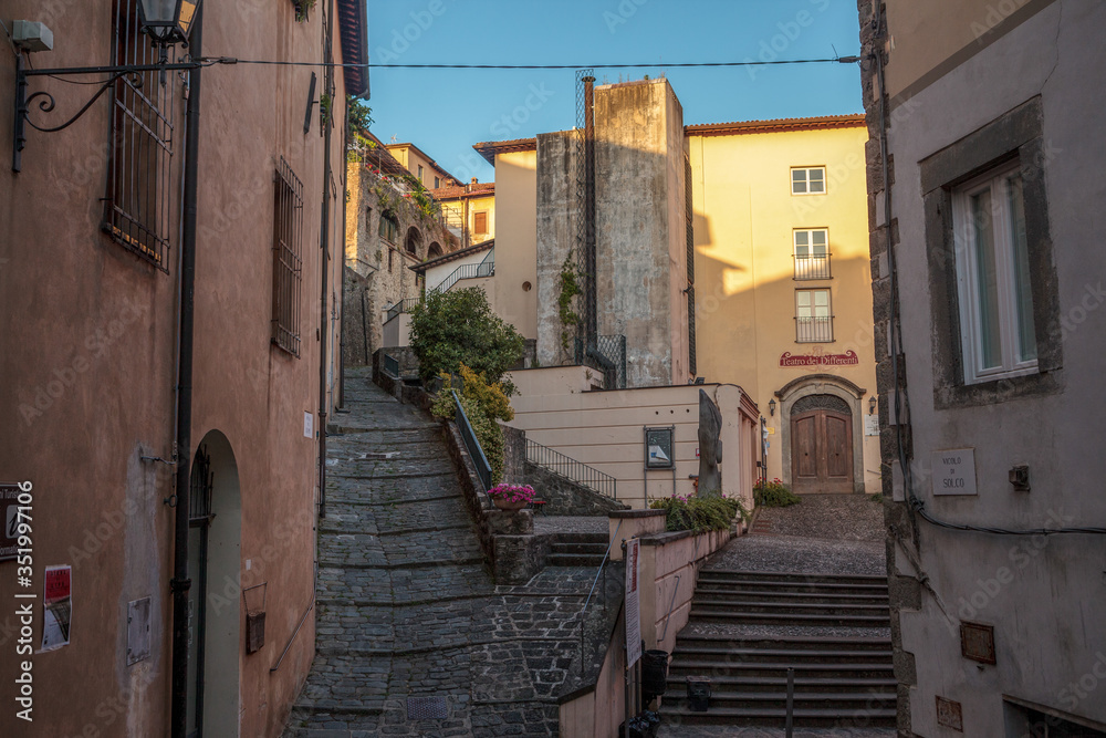 Steep streets of small Italian town Barga, Tuscany, Italy
