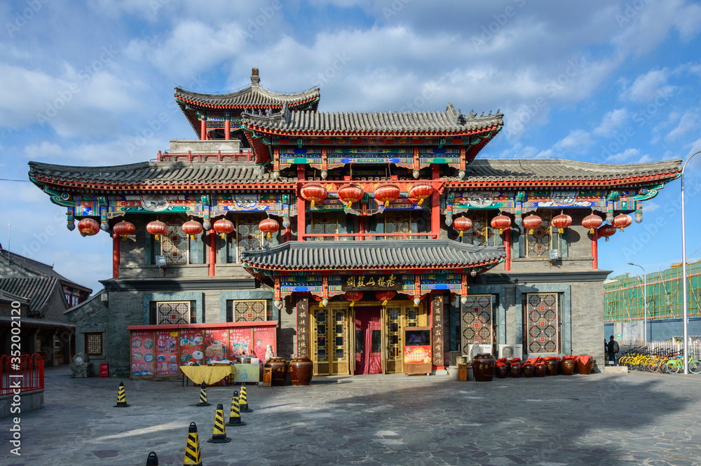 A classic Chinese building with numerous decorations in the old Hutongow district. A classic Chinese building with numerous decorations in the old Hutongow district.