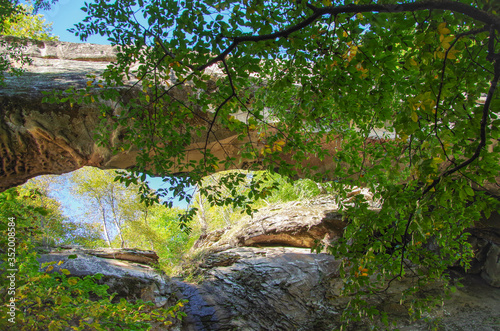 Natural bridge. Arch bridge over the gorge. Ancient sacred place for inhabitants of the region. Height 1400 m above sea level. North Caucasus. Russia, Dagestan, Tabasaransky District, near Kuzhnik