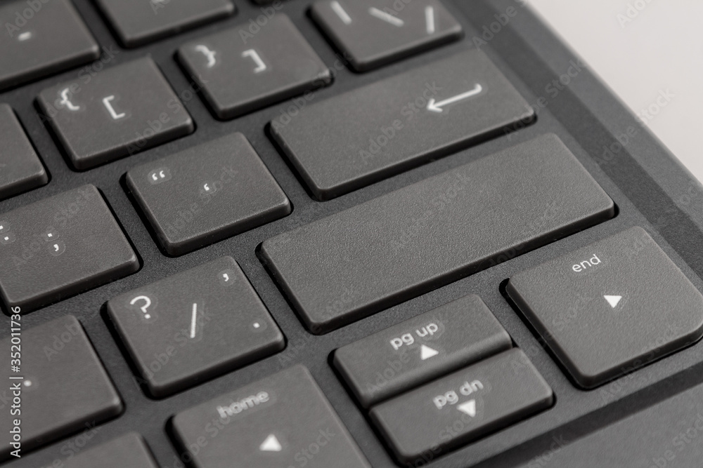 gray keyboard keys of a personal computer or laptop close - up without inscriptions with free space for your text, blank, design, copy space, mock up gray keyboard keys of a personal computer or laptop close - up without inscriptions with free space for your text, blank, design, copy space, mock up