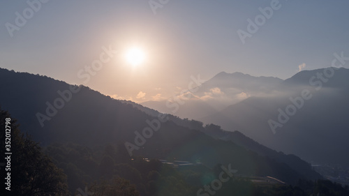 Aerial view of sunset among mountains