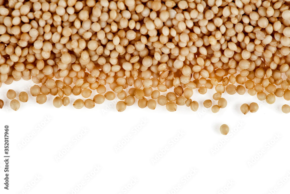 Border of amaranth seeds isolated on a white background. Top view. Border of amaranth seeds isolated on a white background. Top view.
