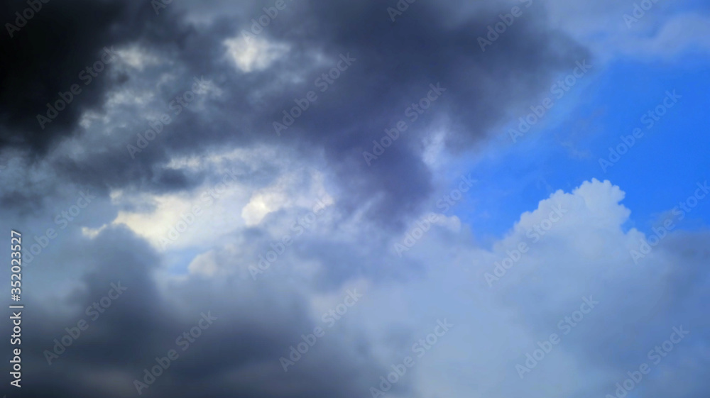 Storm clouds overtook the blue sky before the rain Storm clouds overtook the blue sky before the rain