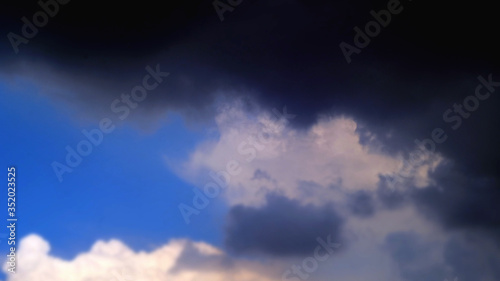 Storm clouds overtook the blue sky before the rain