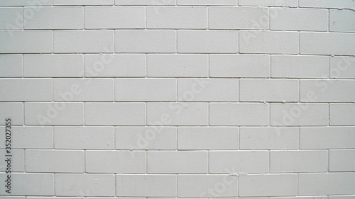 Traditonal old white brick wall texture for background and architecture