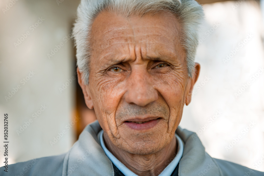 Portrait of a senior man looking at the camera Portrait of a senior man looking at the camera