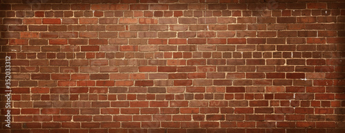 Old natural brick wall background.