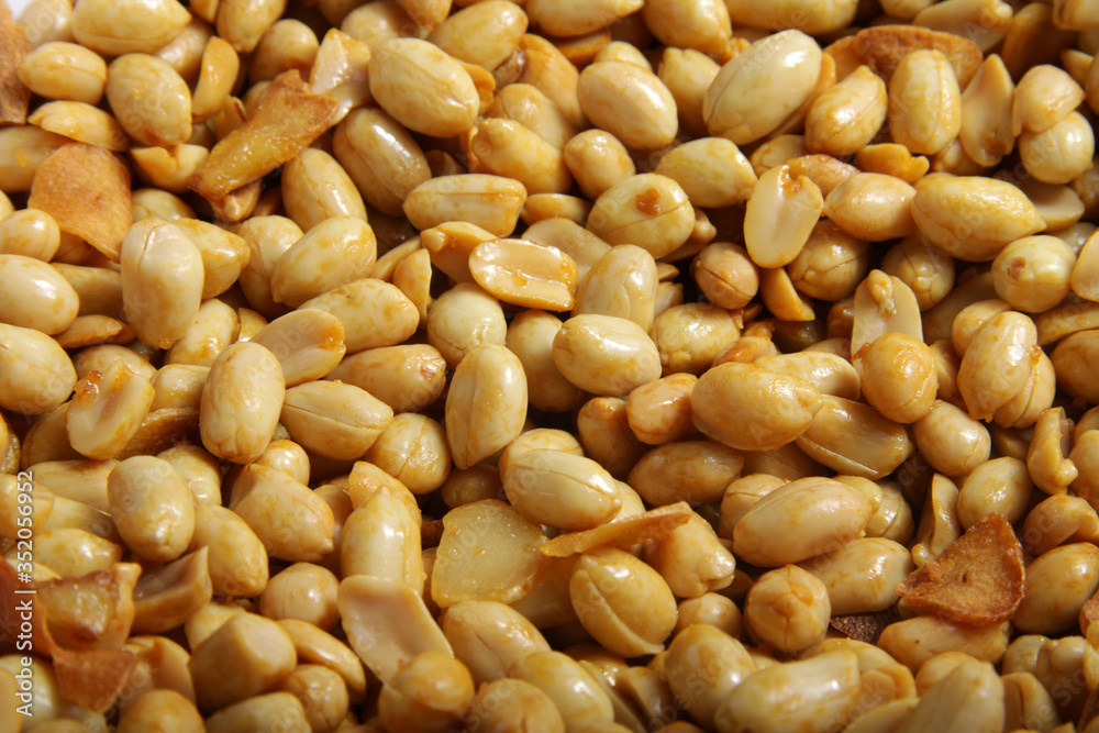 Macro shot of 'kacang bawang' an Indonesian snack that made of fryed peanuts with garlic Macro shot of 'kacang bawang' an Indonesian snack that made of fryed peanuts with garlic