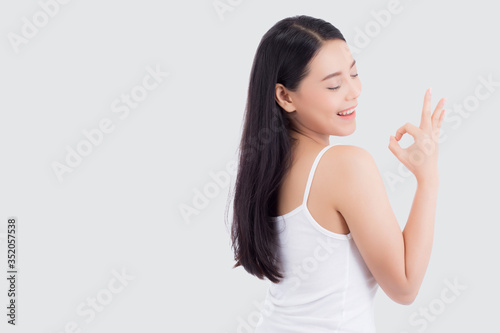 Portrait of beautiful asian woman, beauty of girl with face smile and gesture ok attractive isolated on white background, perfect with wellness and healthcare concept.