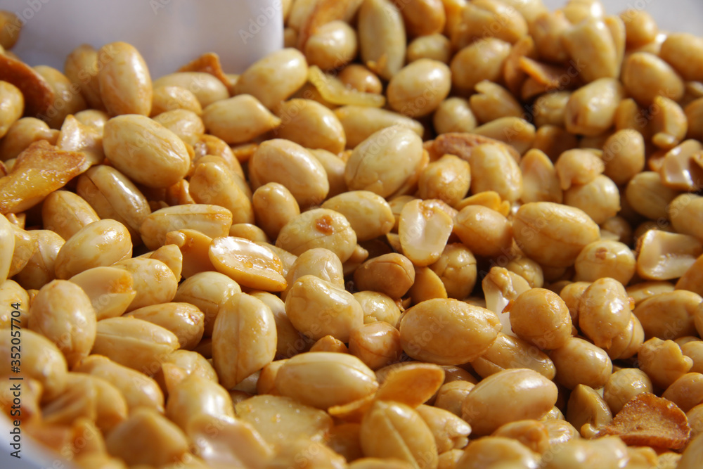Macro shot of 'kacang bawang' an Indonesian snack that made of fryed peanuts with garlic Macro shot of 'kacang bawang' an Indonesian snack that made of fryed peanuts with garlic