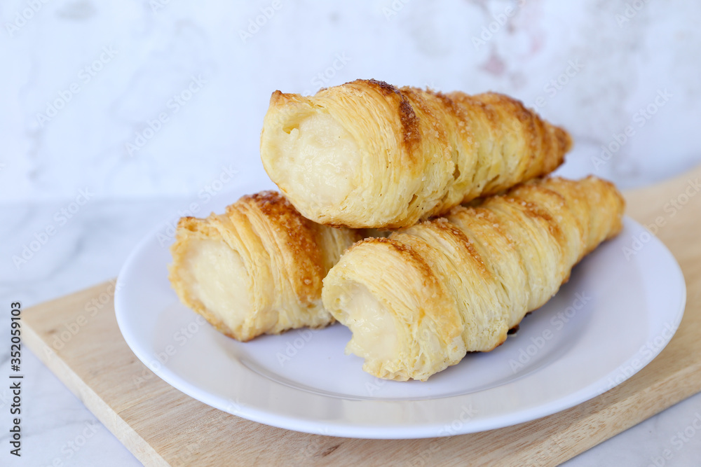 Horn pastry cake with vla or vanilla custard filling. Homemade cumcum cake filled with cream Horn pastry cake with vla or vanilla custard filling. Homemade cumcum cake filled with cream