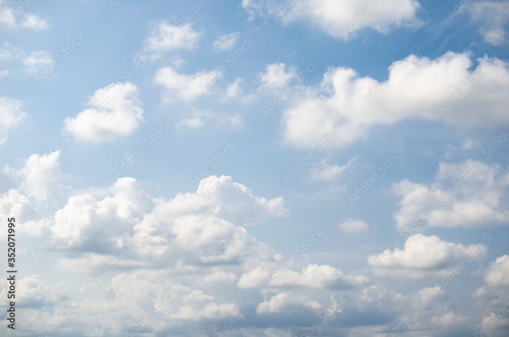 Fototapeta premium blue sky and white fluffy cloud horizon outdoor for background.