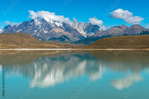 Reflection of the Torres del Paine in the Laguna Amarga, Torres del paine national park, Puerto Natales, Patagonia, Chile.