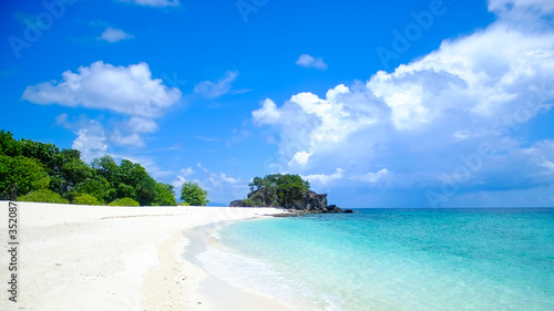 Fototapeta Naklejka Na Ścianę i Meble -  Beautiful landscape view of tropical nature Koh Lipe island paradise Beach with clear ocean water white sand and cloudy blue sky background popular travel holiday vacation trip summer in Thailand.