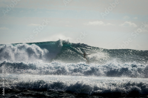 Kiter rides big waves on the island of Mauritius, Indian Ocean