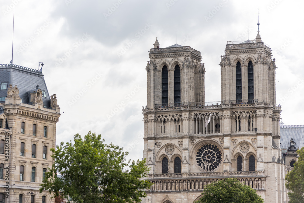 Tower of the Notre-Dame de Paris before the big fire, a medieval Catholic cathedral on the Ile de la Cite in the 4th arrondissement of Paris. Tower of the Notre-Dame de Paris before the big fire, a medieval Catholic cathedral on the Ile de la Cite in the 4th arrondissement of Paris.