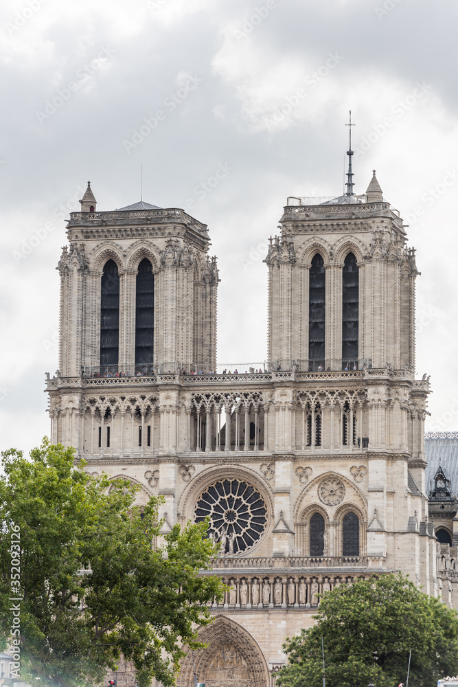 Tower of the Notre-Dame de Paris before the big fire, a medieval Catholic cathedral on the Ile de la Cite in the 4th arrondissement of Paris. Tower of the Notre-Dame de Paris before the big fire, a medieval Catholic cathedral on the Ile de la Cite in the 4th arrondissement of Paris.