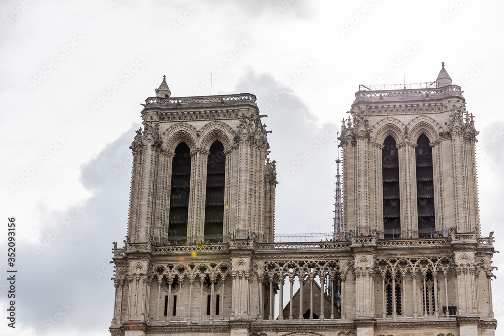 Tower of the Notre-Dame de Paris before the big fire, a medieval Catholic cathedral on the Ile de la Cite in the 4th arrondissement of Paris.