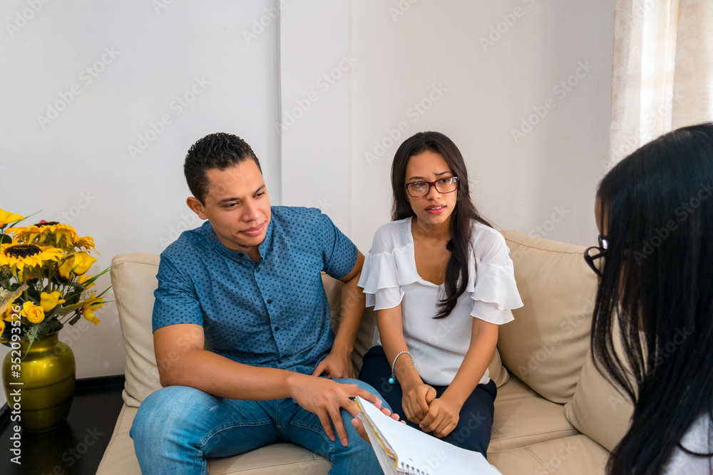 Fototapeta premium Couple talking to a consultant, lawyer or advisor