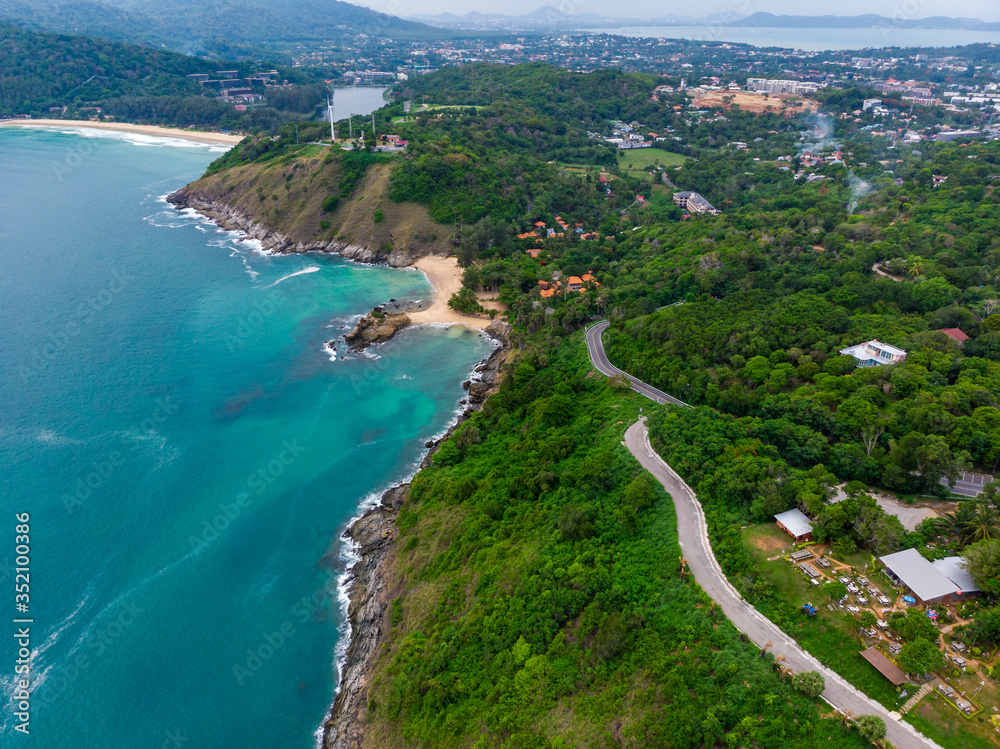 Aerial view of Promthep cape in Phuket Thailand during locked down policy due to Covid-19. Tourist destinations in Phuket are closed to public.