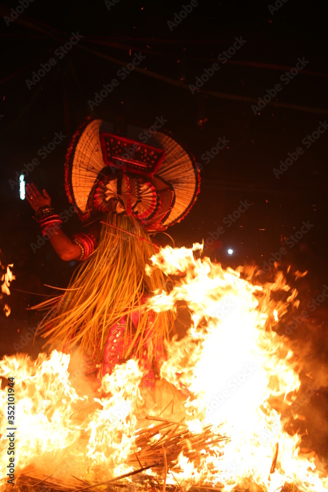 THEYYAM IN THE FIRE THEYYAM - HUMAN GOD OF MALABAR THEYYAM IS AN ...