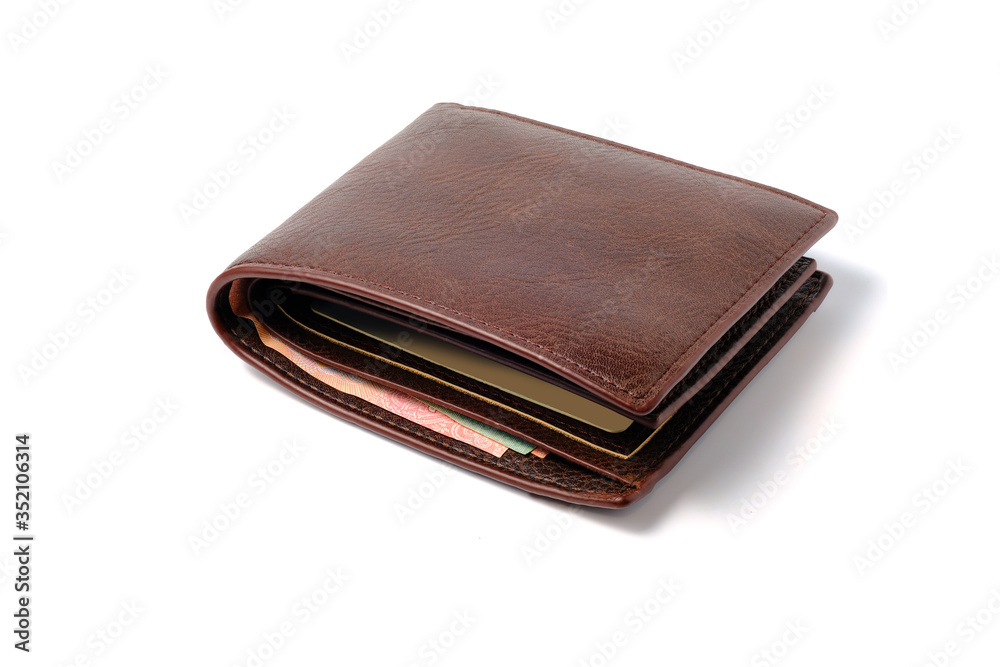 Side view of isolated genuine leather brown with many banknotes on white background. Cash concept. Side view of isolated genuine leather brown with many banknotes on white background. Cash concept.