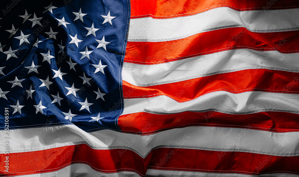 close american flag in the wind on a sunny day