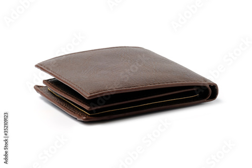 Brown genuine leather wallet with banknotes and credit card inside isolated on white background.