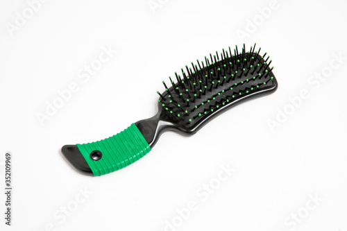 Hairbrush isolated on white background. High-resolution photo.Perspective view.