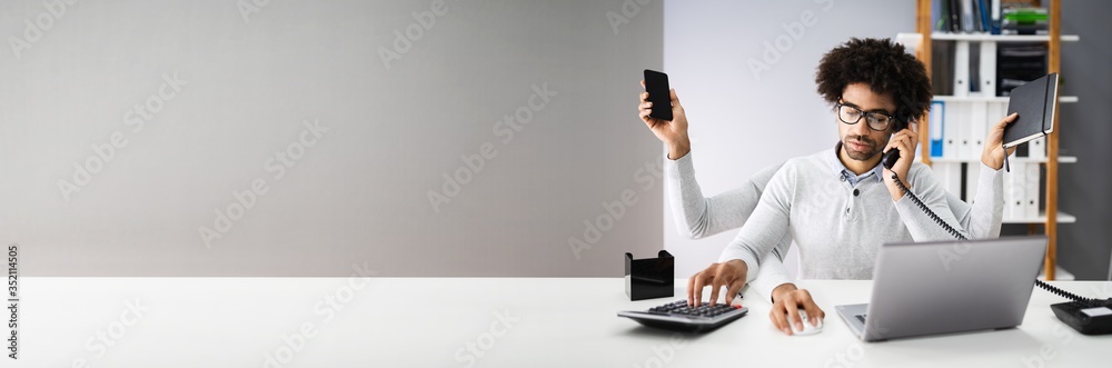 Multitasking Businessman In Office Multitasking Businessman In Office