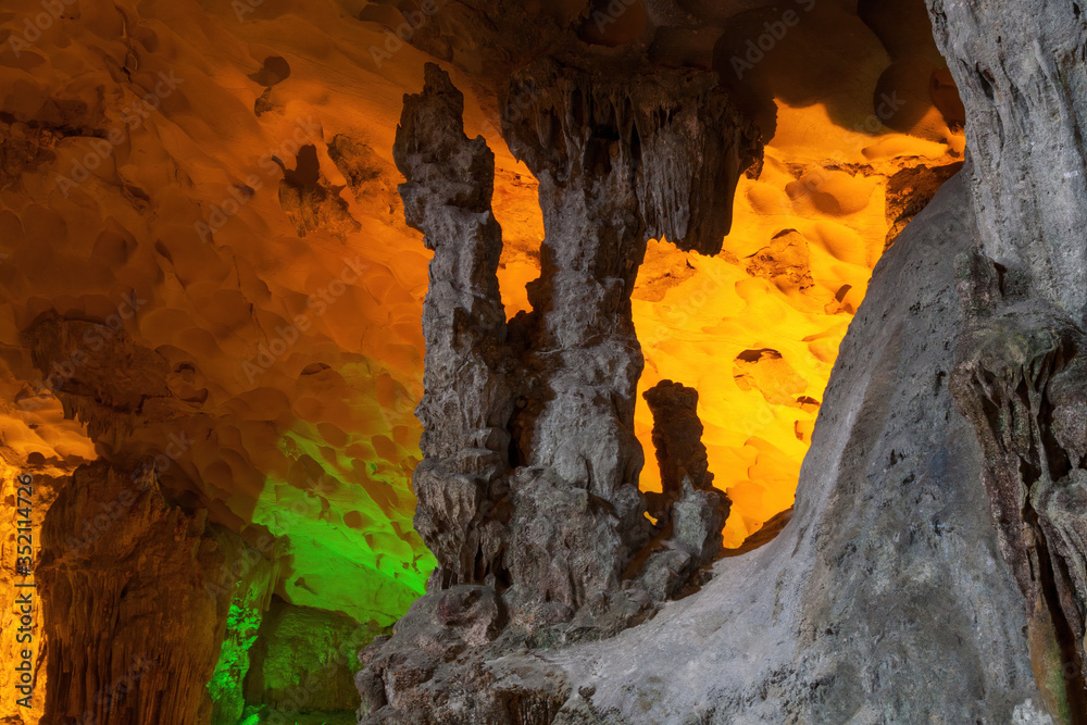 Stalactite and stalagmite formations in a limestone cave of Halong Bay, Vietnam Stalactite and stalagmite formations in a limestone cave of Halong Bay, Vietnam