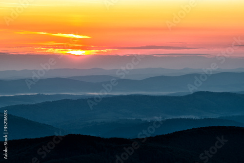 Fototapeta Naklejka Na Ścianę i Meble -  Wonderful sunrise in the mountains. A view from the Polonina Carynska. Bieszczady National Park. Carpathians. Poland.