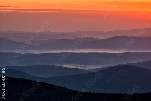 Fototapeta Naklejka Na Ścianę i Meble -  Wonderful sunrise in the mountains. A view from the Polonina Carynska. Bieszczady National Park. Carpathians. Poland.