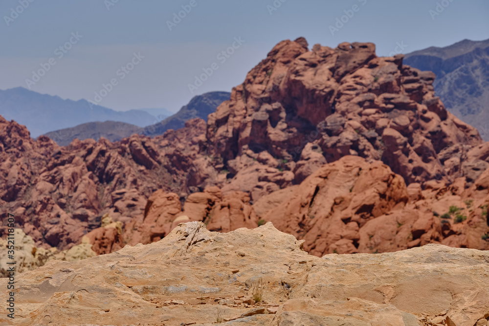 White rocky ledge with a steep drop off in the Nevada Desert White rocky ledge with a steep drop off in the Nevada Desert
