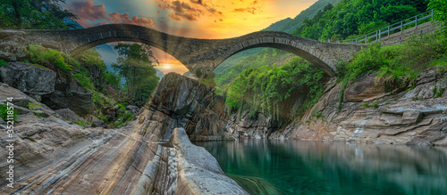 Panoramic Double arch stone bridge at Ponte dei Salti with waterfall and sunlight, Lavertezzo, Verzasca, Canton Tessin, Switzerland. Travel concept Ticino. photo