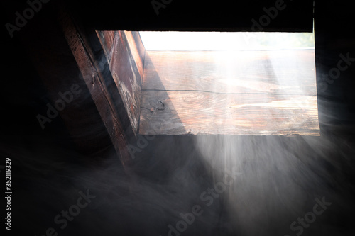 Visible flow of air through the attic window