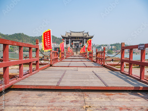 Chaozhou China-02 April 2018 Unacquainted people on Guangji Bridge at Chaozhou City China.also known as Xiangzi Bridge is an ancient bridge that crosses the Han River east of Chaozhou