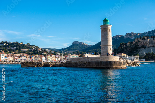 Scenic lighthouse at the entrance of Cassis harbor, France.