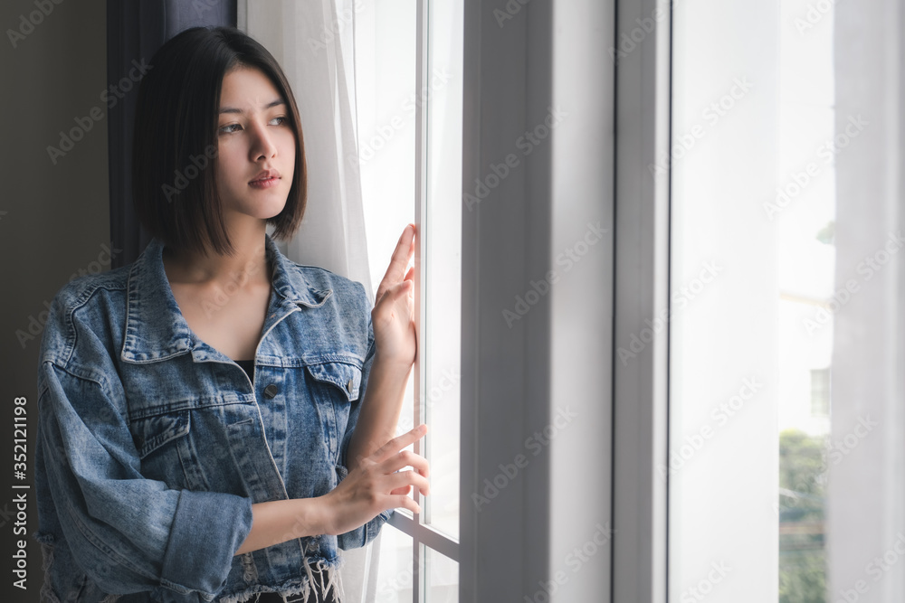 Beautiful Girls Teenage Drinking coffee hot In the house window in the morning holiday Wearing gray pajamas After waking up bright Happy Beautiful Girls Teenage Drinking coffee hot In the house window in the morning holiday Wearing gray pajamas After waking up bright Happy